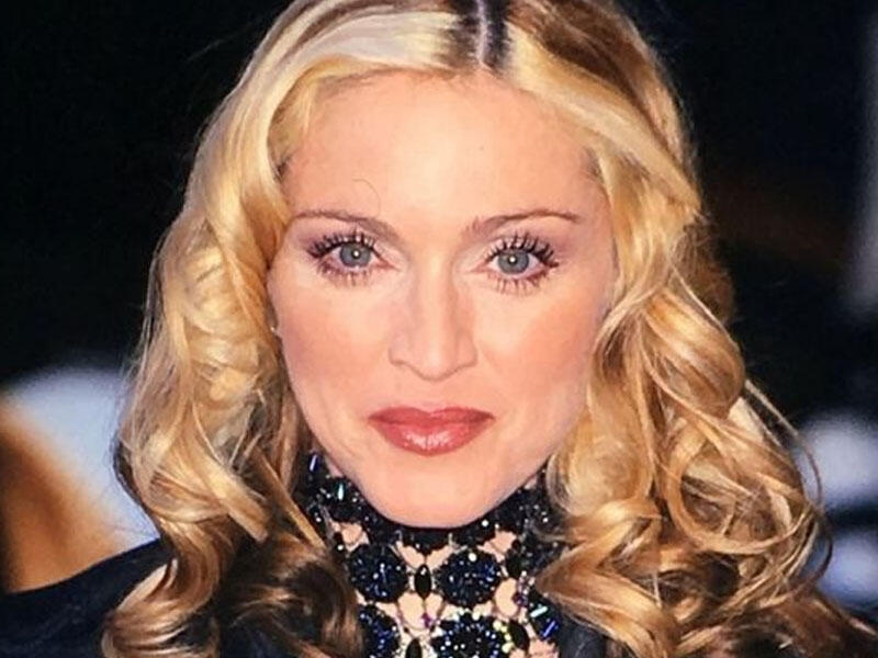 Madonna afrikalı uşaqların ticarəti və cinsi istismarda ittiham olunur 